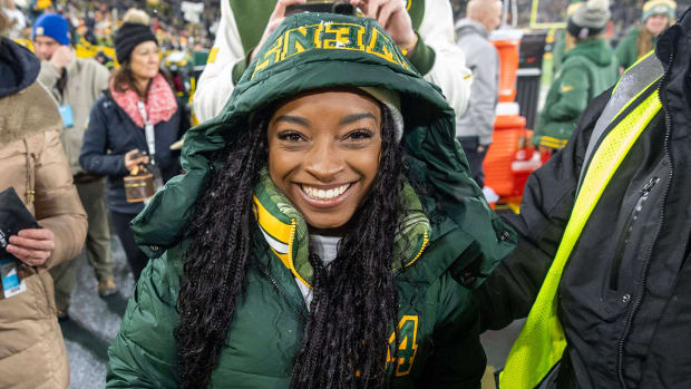 Simone Biles pictured before a game between the Packers and Chiefs at Lambeau Field.